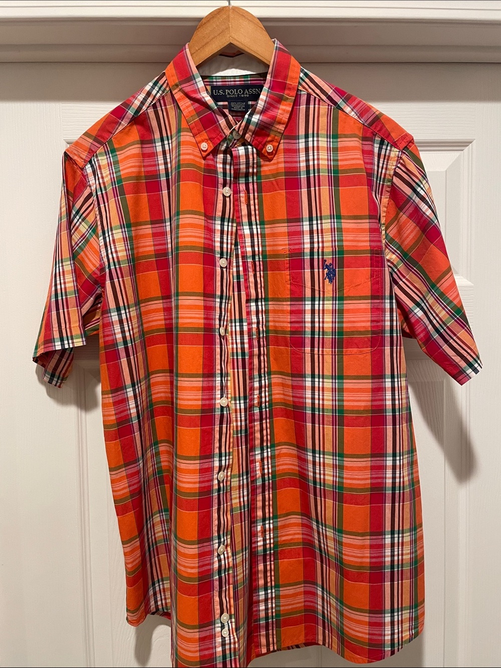 U.S. Polo Assn. Orange & Red Plaid Short-Sleeve Button-Down Shirt.
Unisex